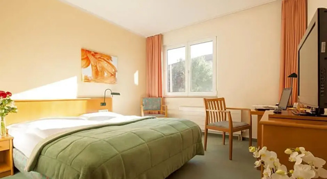 Conforto quarto Apart Hotel Gera
