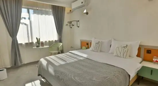 Люкс Leshan Futai Homestay (Zhanggong Bridge)