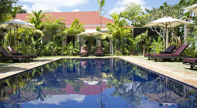 Кровать в общем номере The Oasis Harbor