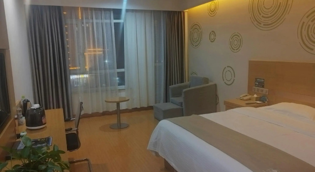 GreenTree Inn Shandong Heze Caoxian Zhuangzhai Town Oriental Times City Business Hotel, Rezerwuj Hotel Heze Shandong