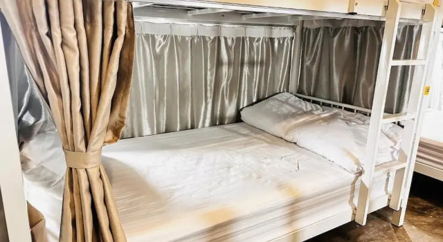 Bett im Wohnheim TT Hostel
