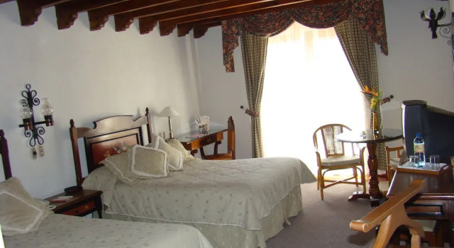 Четырёхместный номер Executive с балконом Mansion del Cupatitzio