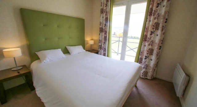 Кровать в общем номере Дуплекс Résidence Villa Bellagio Amboise by Popinns