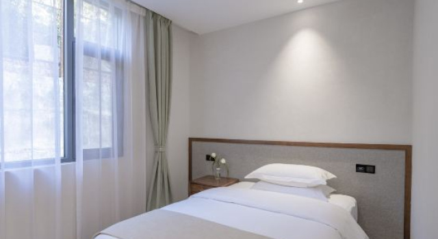 Трёхместный люкс Yuanfangdejia Guesthouse
