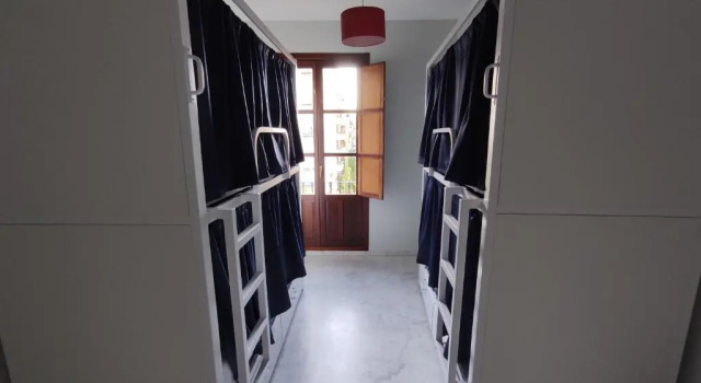 Кровать в общем номере New Samay Hostel