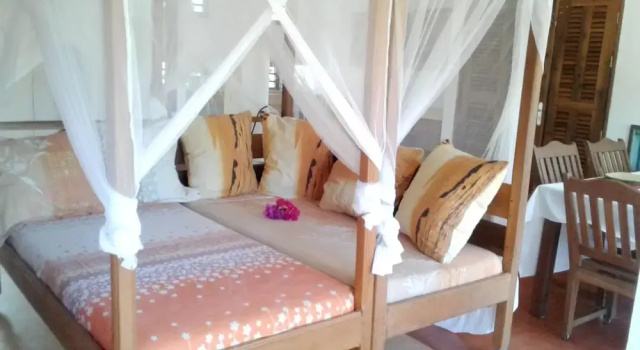 House with One Bedroom in Andilana, with Wonderful Sea View, Pool Access And Furnished Terrace - 800 M From the Beach, Забронировать Дом для отпуска Отели Дзамандзари с парковкой, Парковка