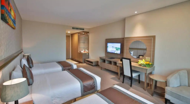 Трёхместный номер Deluxe Muong Thanh Luxury Ca Mau Hotel