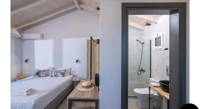 Номер Deluxe Anemos Suites by Estia