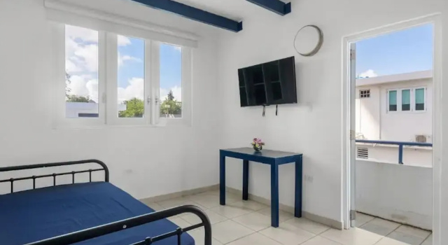 Otium Vacation Rental With Pool Steps From The Beach Parking Pet Friendly, Забронировать Апартаменты/квартира Сантурсе 