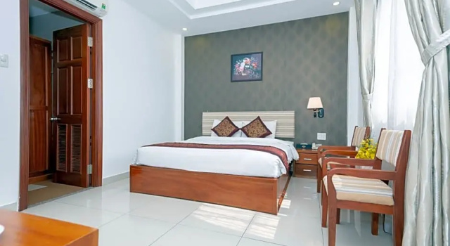 Двухместный номер Deluxe Airport Saigon Hotel - Gần ẩm thực đêm chợ Phạm Văn Hai