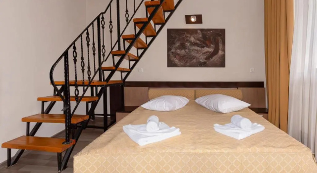 Четырёхместный номер Standard Дуплекс Hotel Grand