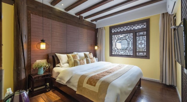 Люкс Lijiang Gui Yuan Tian Ju Guesthouse