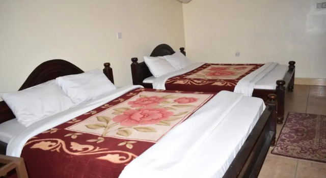 Rainbow Executive Lodge, 予約 ホテル Boma la Ngombe Hai