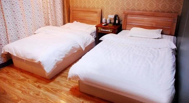 Mudanjiang Xinjiayuan Express Inn, Rezervovat Hotel Mu-tan-ťiang Heilongjiang