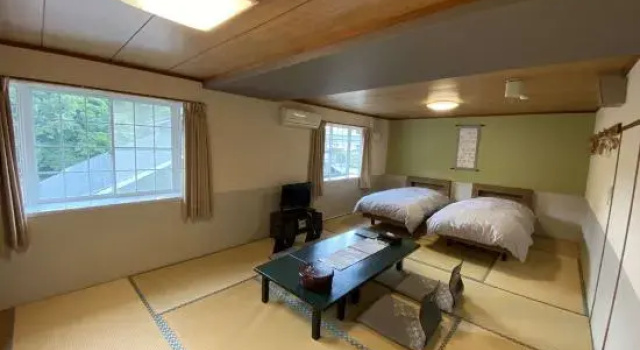 Кровать в общем номере Japanese Auberge Matsu-tsuru