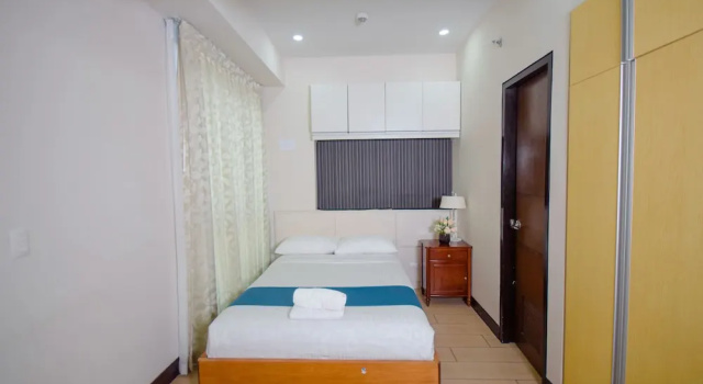 Двухместный люкс Executive с балконом и с видом на океан EJB room at the Mactan Newton