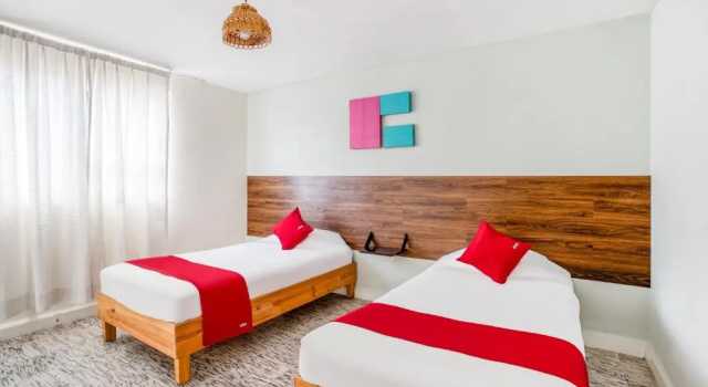 Четырёхместный номер Standard Hotel Suites Puebla