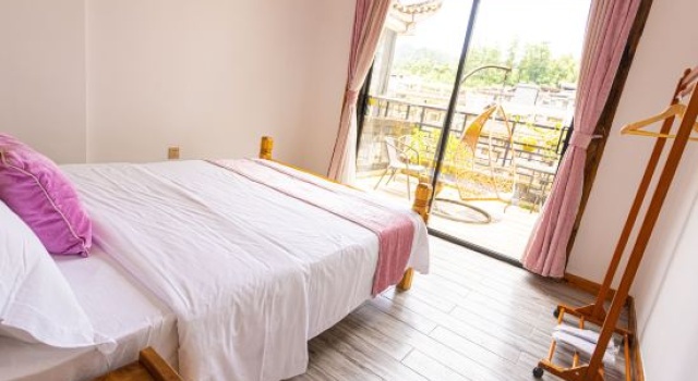 Люкс Huer Caowu Riverview Guesthouse