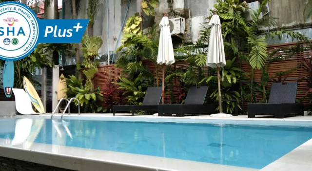 Кровать в общем номере Evergreen Resort