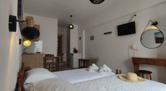 Четырёхместный номер Standard Kapetanos Rooms