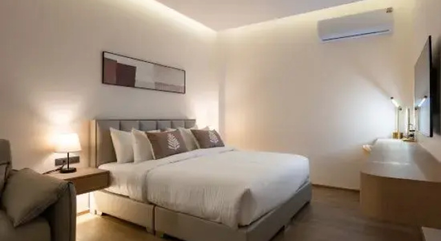 Кровать в общем номере Brand New Pool Villa 8BR/Sauna/Pool Table/Fitness/BBQ/EV Charger