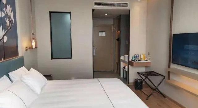 Magnotel Jining Zoucheng Sanxing Road, Забронировать Отель Цзинин Шаньдун