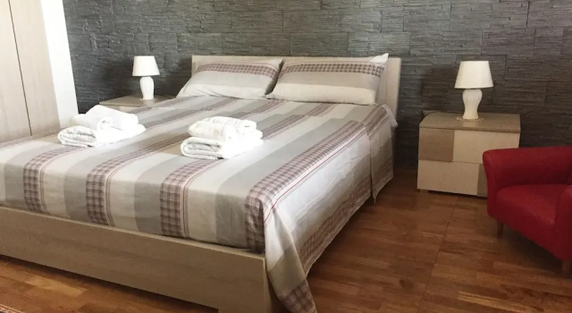 Семейные апартаменты с 3 комнатами с балконом и с видом на сад Casale Cappuccini