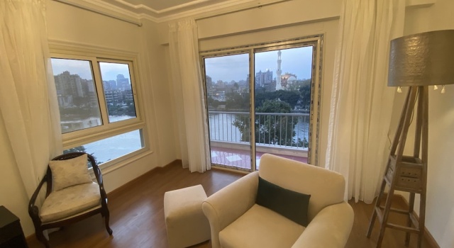 Nile View Apartment - Sleeps 4 & Balcony, Забронировать Апартаменты/квартира Апартаменты Каира, рядом с British Council Egypt, Апартаменты/квартира