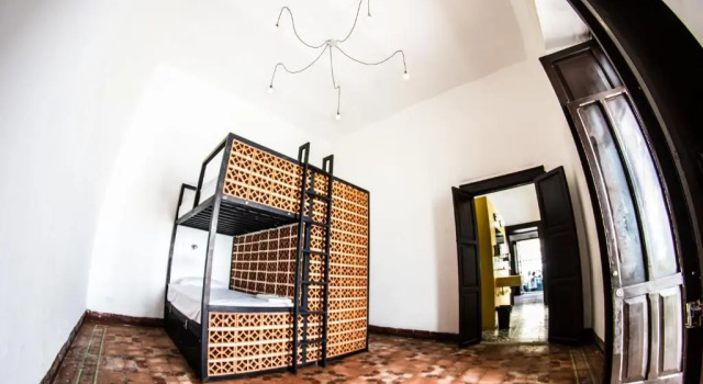 Кровать в общем номере Gente de Más Bnb