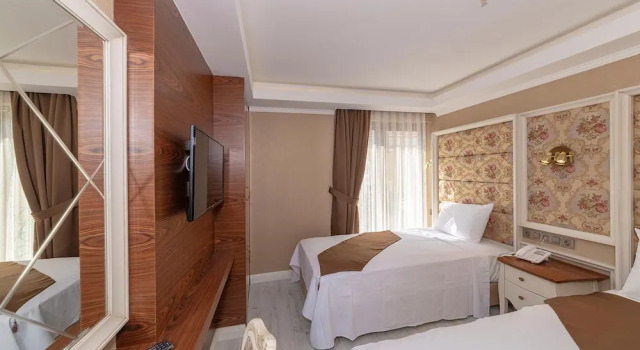 Standardowy trzyosobowy pokój Sultan City Hotel