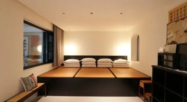 Кровать в общем номере Yuyeshan Residence
