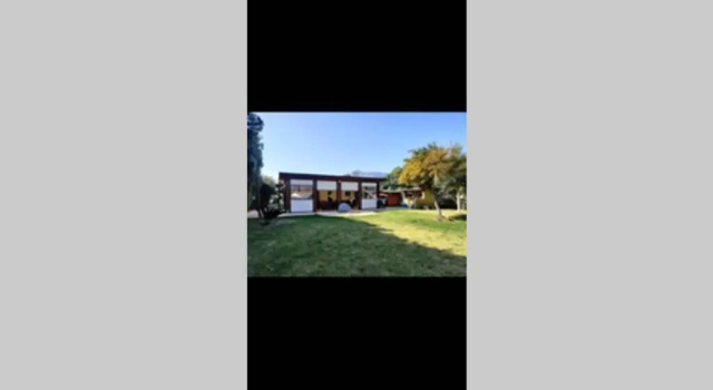 Коттедж с 2 комнатами Casa vacanze a 50 mt dal mare con ampio giardino e parcheggio privato