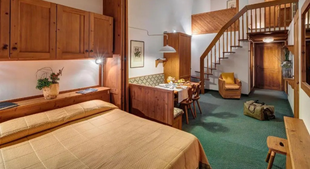 Четырёхместный номер Standard Hotel Cristallino d'Ampezzo