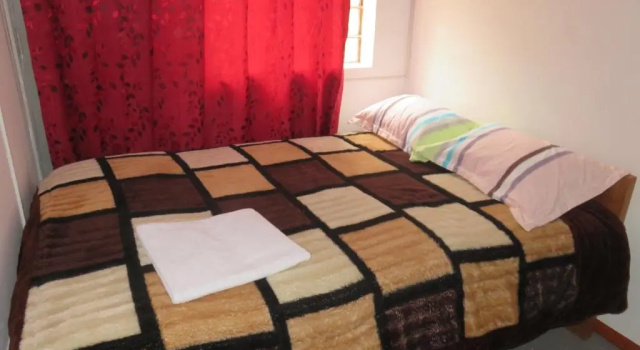 Gazdaságos triplaágyas szoba Tinki Hostel