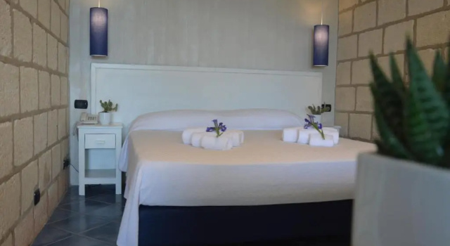 Трёхместный номер Standard CapoSperone Resort