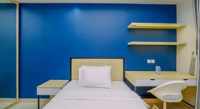 Студия Standard Comfy and Minimalist Studio with City View at Evenciio Margonda Apartment
