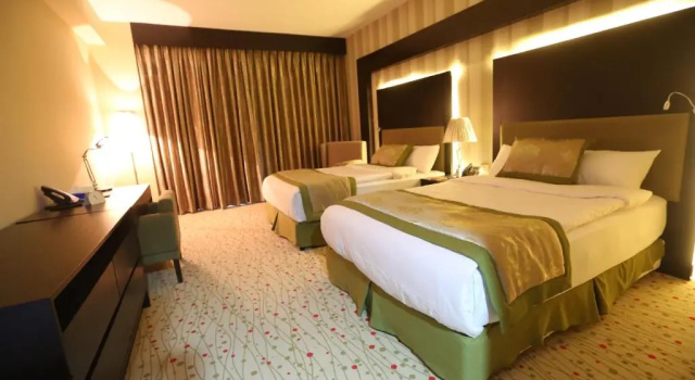 Номер Standard Palestine Plaza Hotel