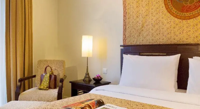 Двухместный номер Deluxe с балконом The Phoenix Hotel Yogyakarta - Handwritten Collection