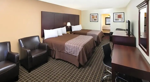 Полулюкс GuestPlace Inn & Suites