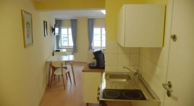 Апартаменты Boutique Charme Apartments Küferstr 4-6