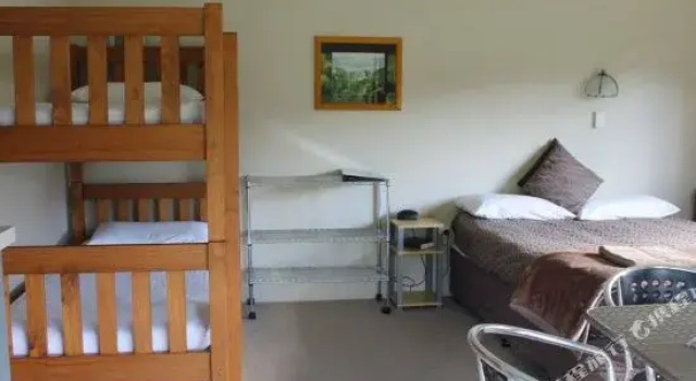 Kauri Coast TOP 10 Holiday Park, Забронировать Отель Kaihu 