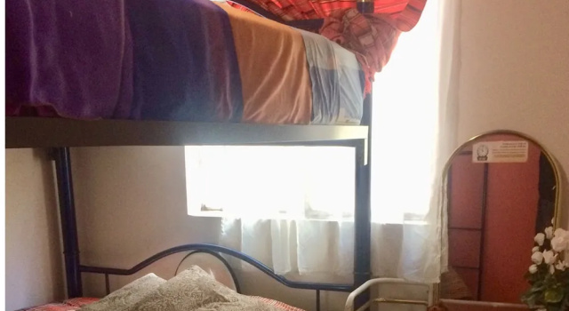 Кровать в общем номере Quito Family And Youth Hostel