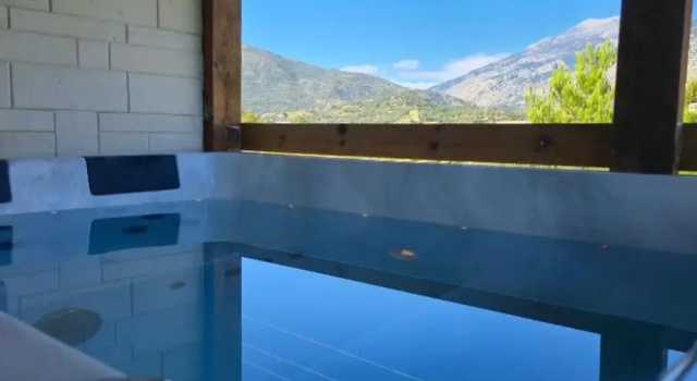 Коттедж Zaros Traditional House - Private Hot Tub Retreat