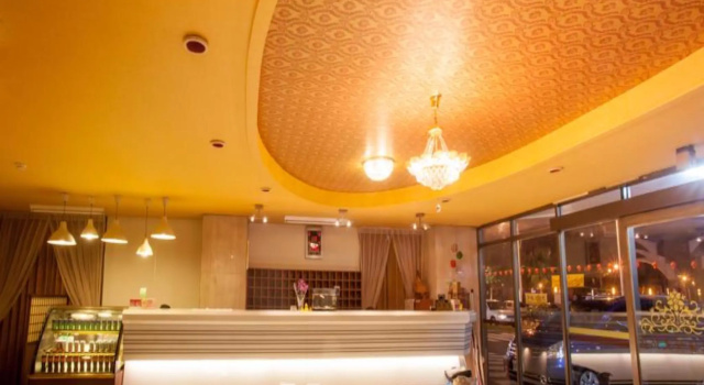 Кровать в общем номере Gene Long Haiy Att Hotel