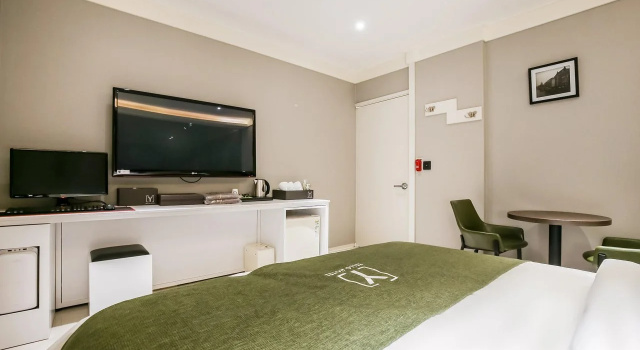 Yellow Hotel, Забронировать Отель П'Хунньяк-голь провинция Чхунчхонбук-до