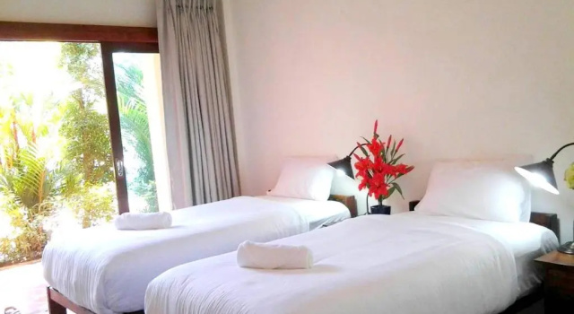Кровать в общем номере Siam Tara Resort Chiangkhong