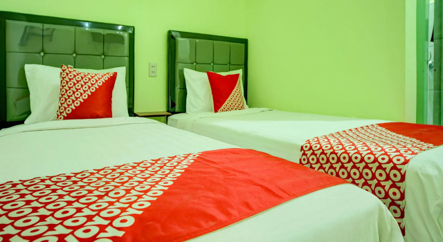 Двухместный номер Deluxe Hotel O Parapat Near Dermaga Ajibata Formerly Pudan Residence 2