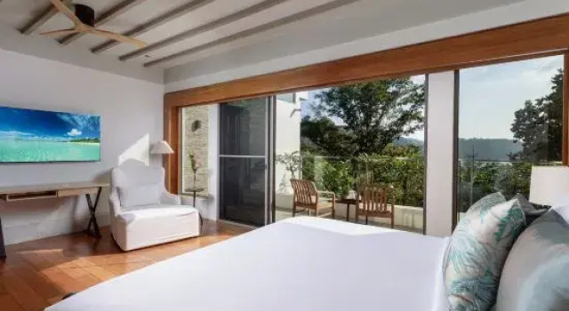 Cama em dormitório 6 quartos Villa Amankara