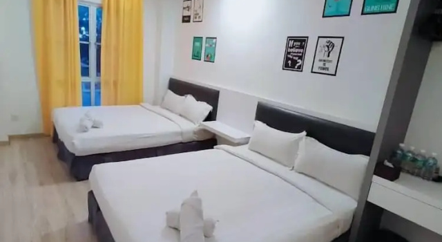 Четырёхместный семейный номер Standard Hotel Zamburger Plaza Mahkota