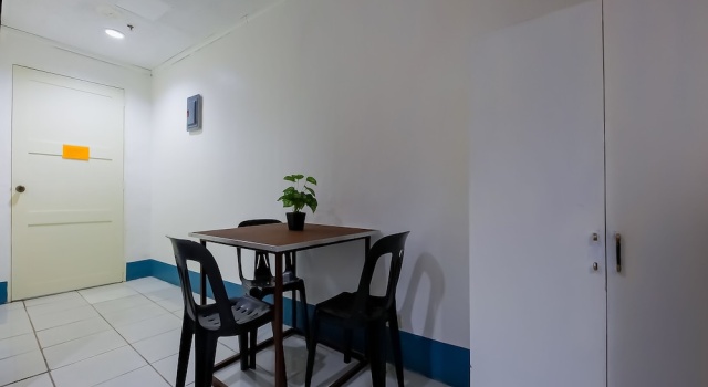Кровать в общем номере OYO 809 Crowne One Condo